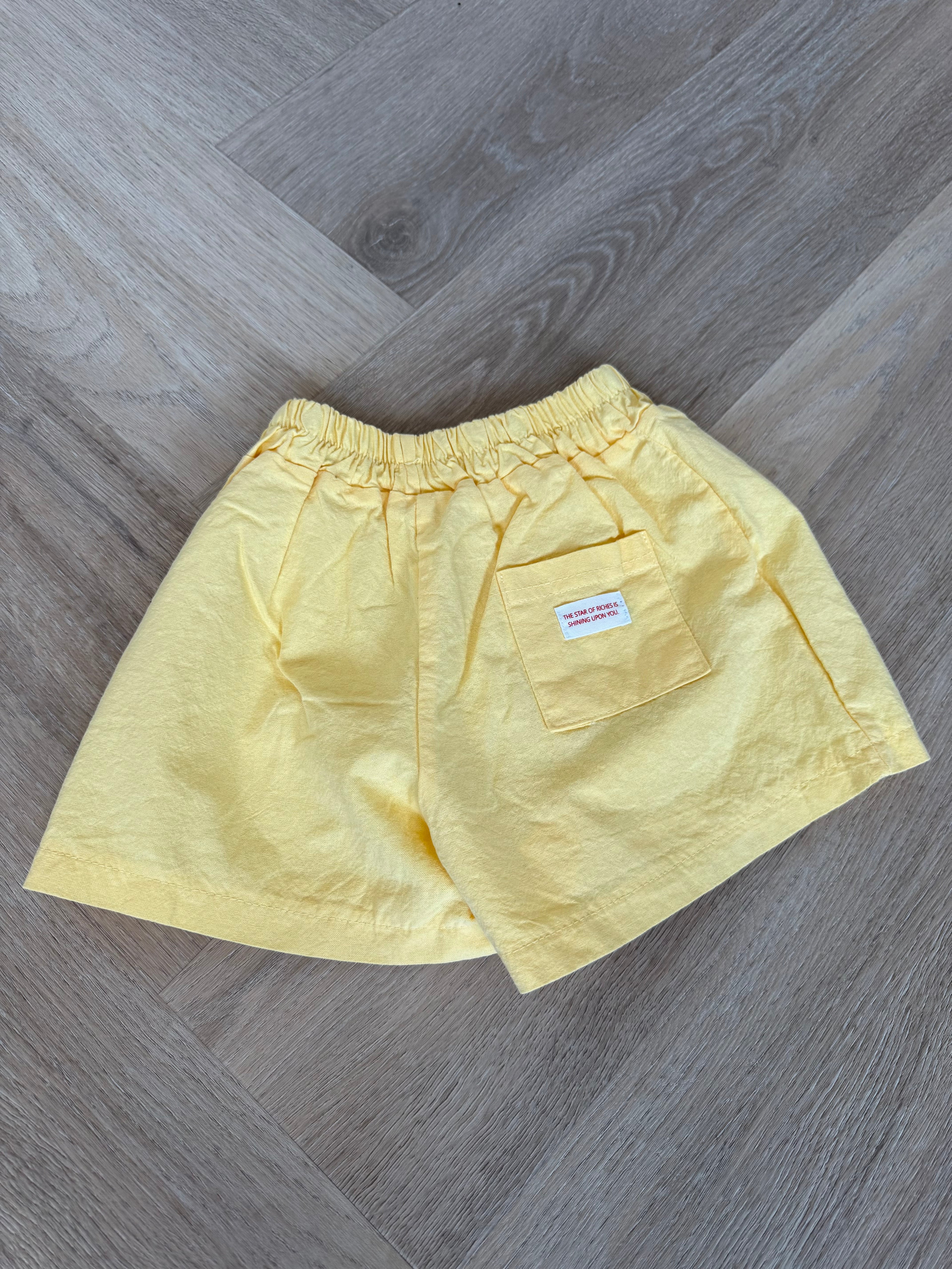 Pastel yellow shorts