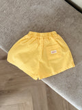 Pastel yellow shorts