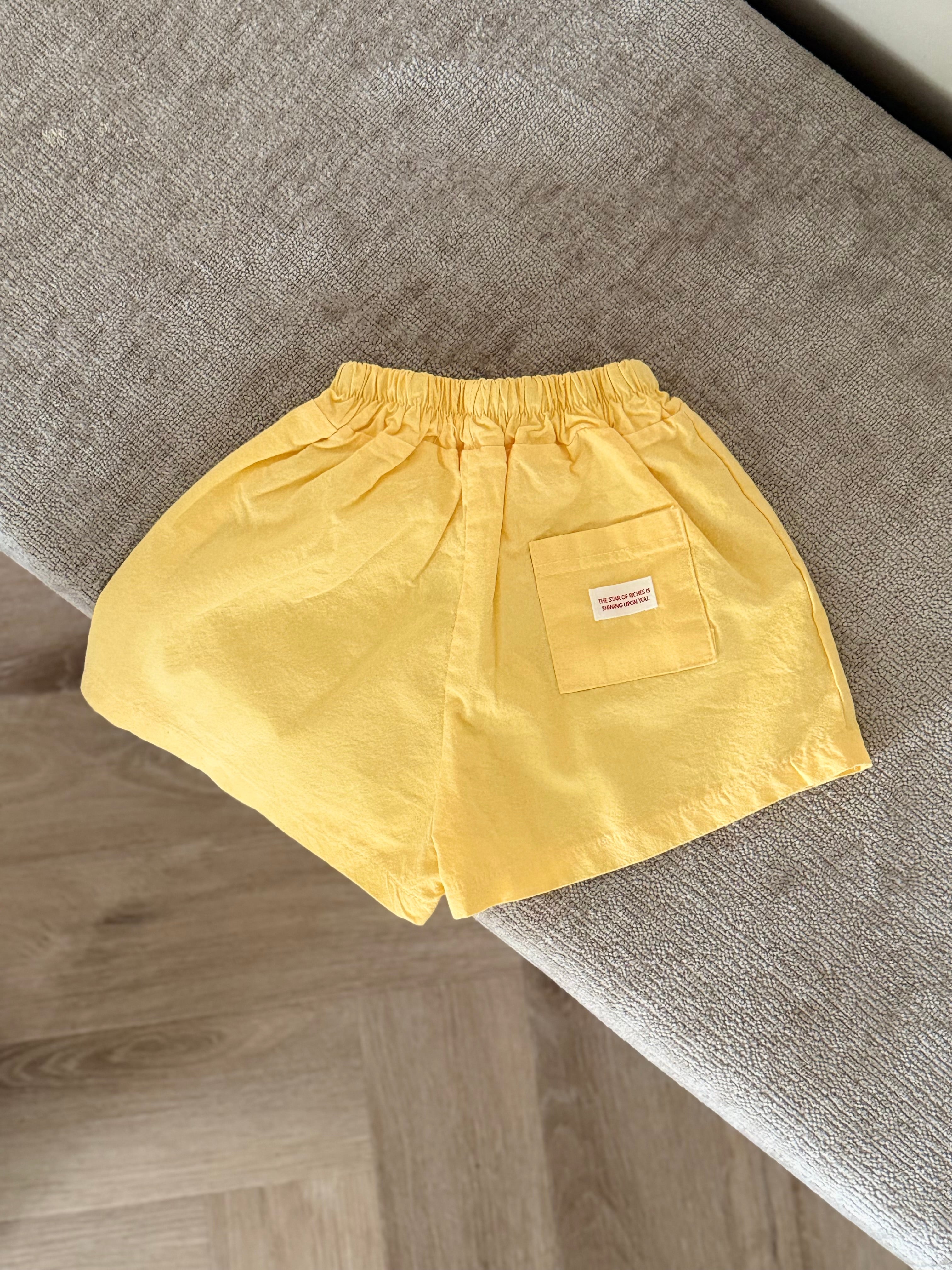 Pastel yellow shorts